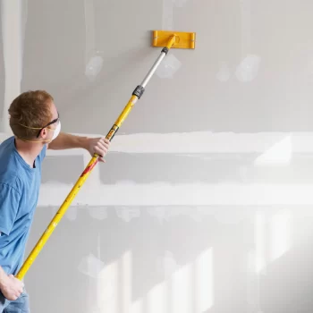 man-sanding-drywall-97559794-6a531fa1b52c484b9e9f0843969f8863