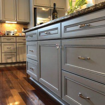 New-hardware-and-fresh-paint-on-these-newly-refinished-cabinets